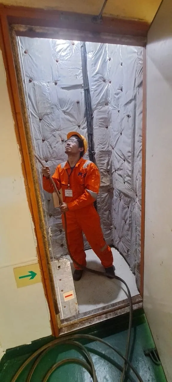Pioneer Offshore Solutions welder performing thruster component welding inside an insulated tank